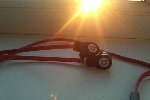 Cool headphones on a bright light background