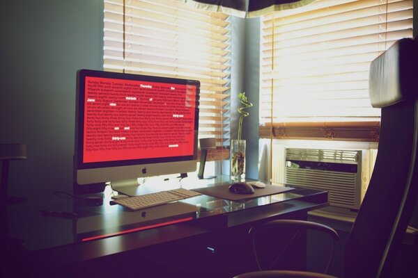 Workplace at the computer in the apartment