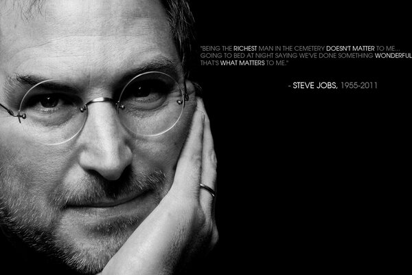 Steve Jobs with glasses on a black background