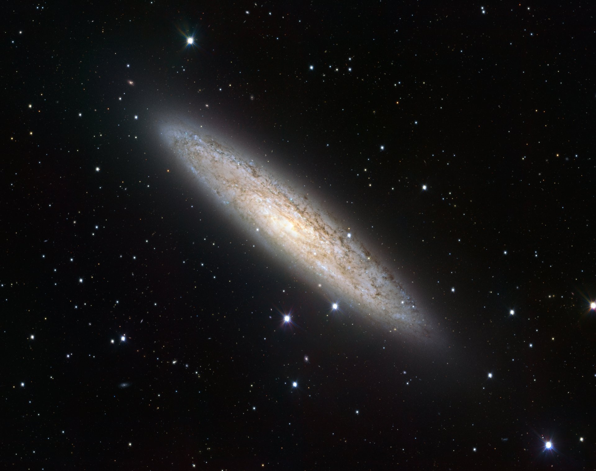 ngc 253 галактика созвездие скульптор серебряная монета