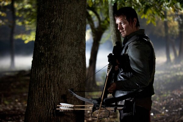Daryl Dixon with a crossbow. the walking dead