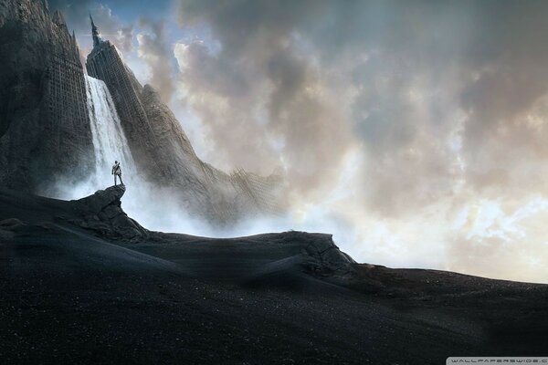 Tom Cruise on the background of a waterfall