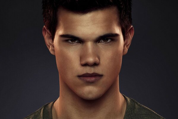 Taylor lautner on a black background