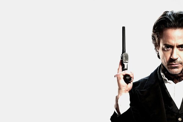 Un homme armé. acteur Robert Downey Jr.