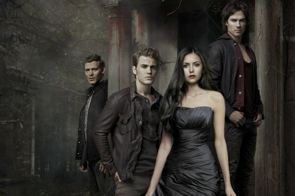 Ian Somerhalder, Joseph Morgan, Nina Dobrev on the background of the crypt