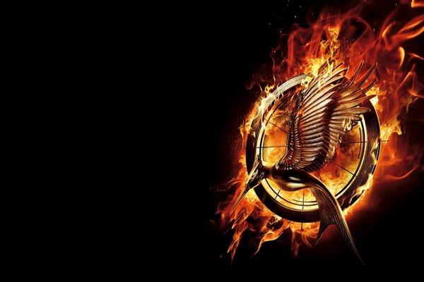 The Hunger Games logo on a black background