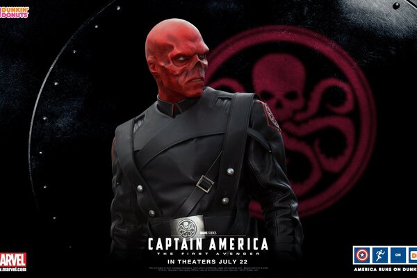 A sinister alien creature with red skin in a military uniform