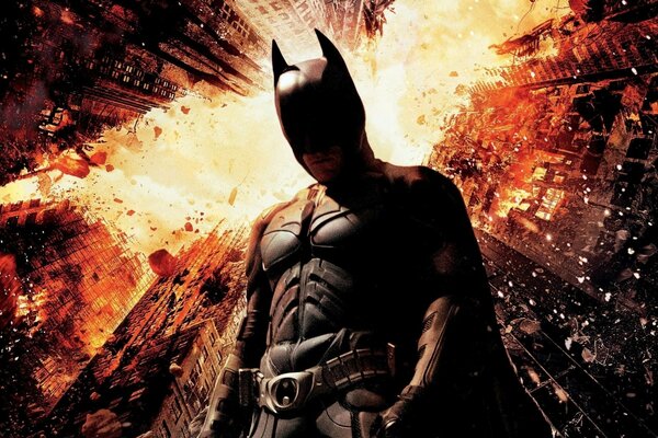 Batman, a man in a black figure skater costume in a mask with horns on the background of an exploding city