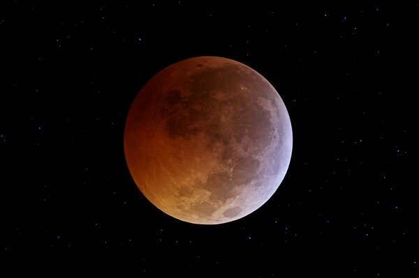 The moon colored red during the eclipse