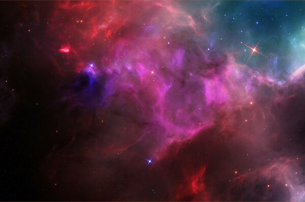 Il bagliore di una nebulosa cosmica nello spazio