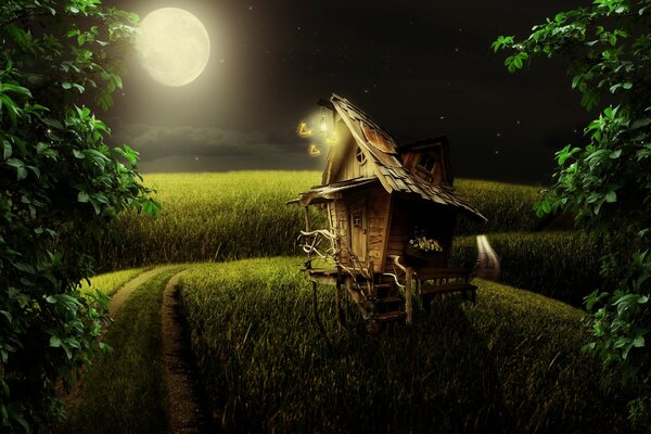 Notte di luna. casa insolita in un campo vicino alla strada