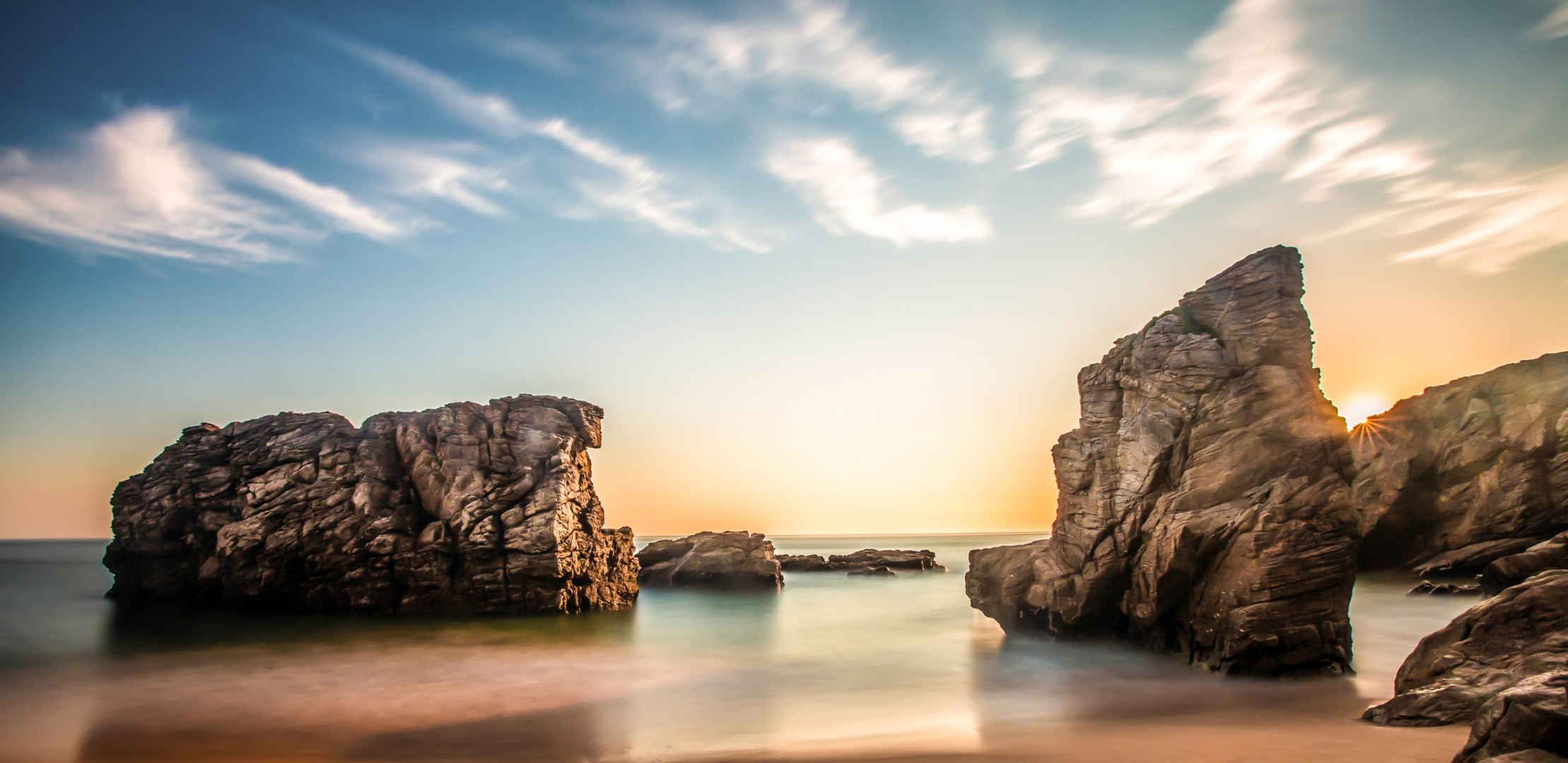 clouds morning beach sun sky sea rock sunrise