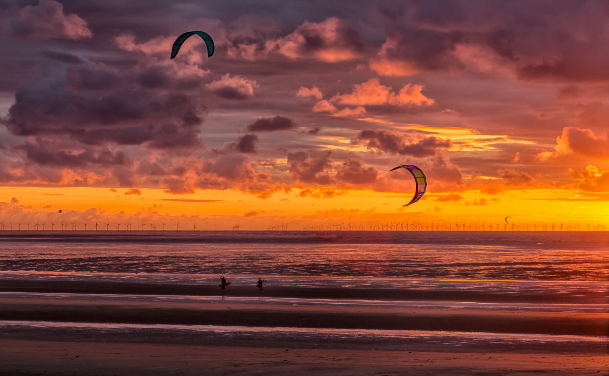 spiaggia tramonto kite surfers new brighton