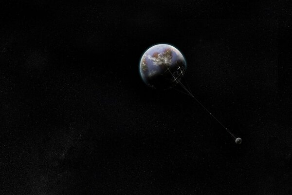 La tierra con la Luna en el espacio sobre un fondo negro