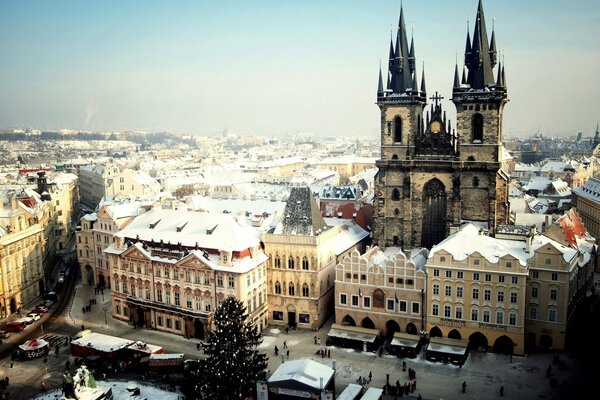 The sun illuminates the Old Town Square of the Czech Republic