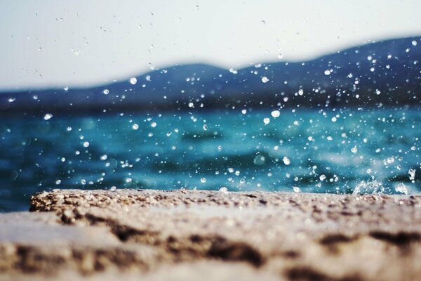 Sea spray breaks on the rocks