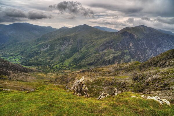 Mountains and mountain slopes in cloudy weather