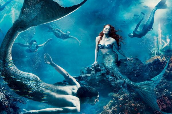 Mermaids and mermaids swim in the ocean