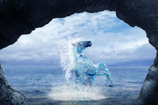 Image of a horse in the water through the rocks