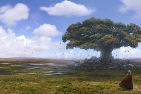 A traveler walking to a tree against the background of clouds