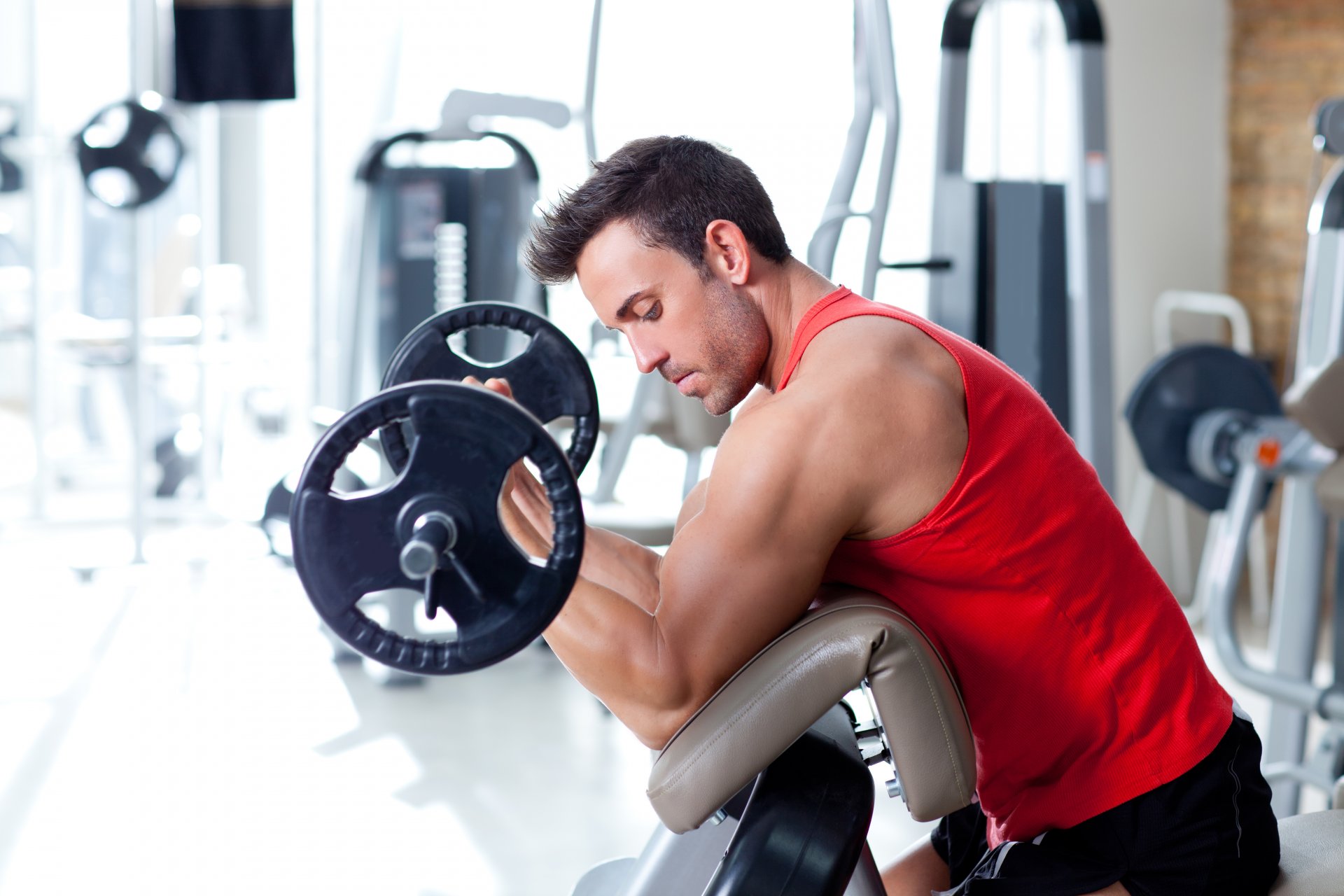 biceps exercises man muscles effort training