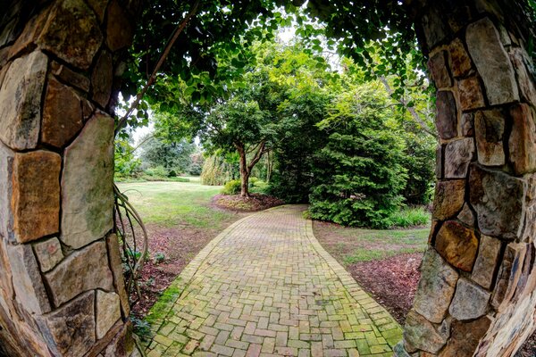 Stone arch and and path to the forest