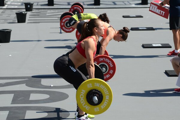 Girls compete in weightlifting