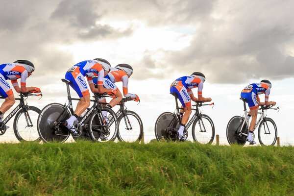 Cyclists race on the field