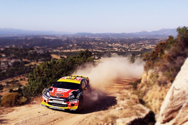 Dusty photo from a race in the desert. Race for Ford speed