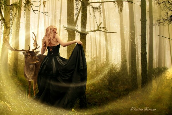 A girl in a black dress with a deer in the forest