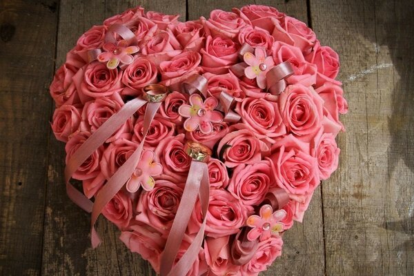 Bouquet of pink roses in the form of a heart