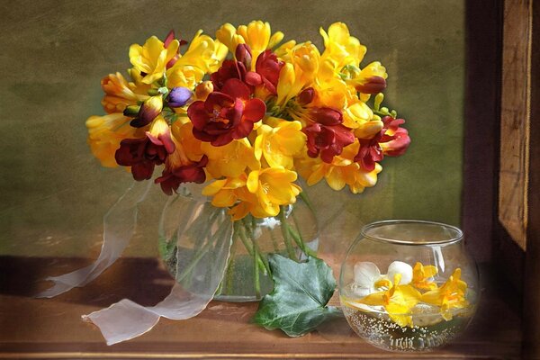 Still life of flowers and ribbons