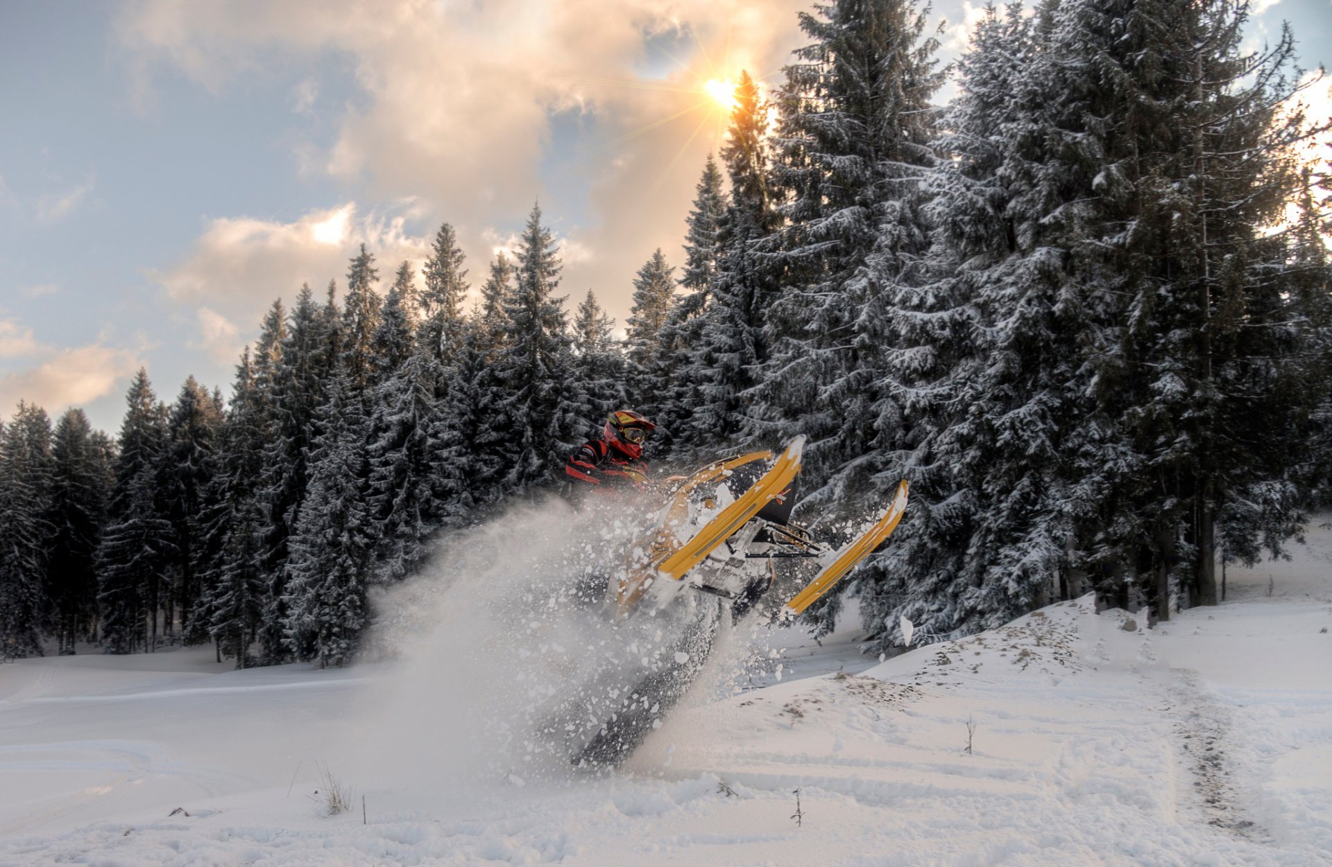 moto de nieve salto atleta