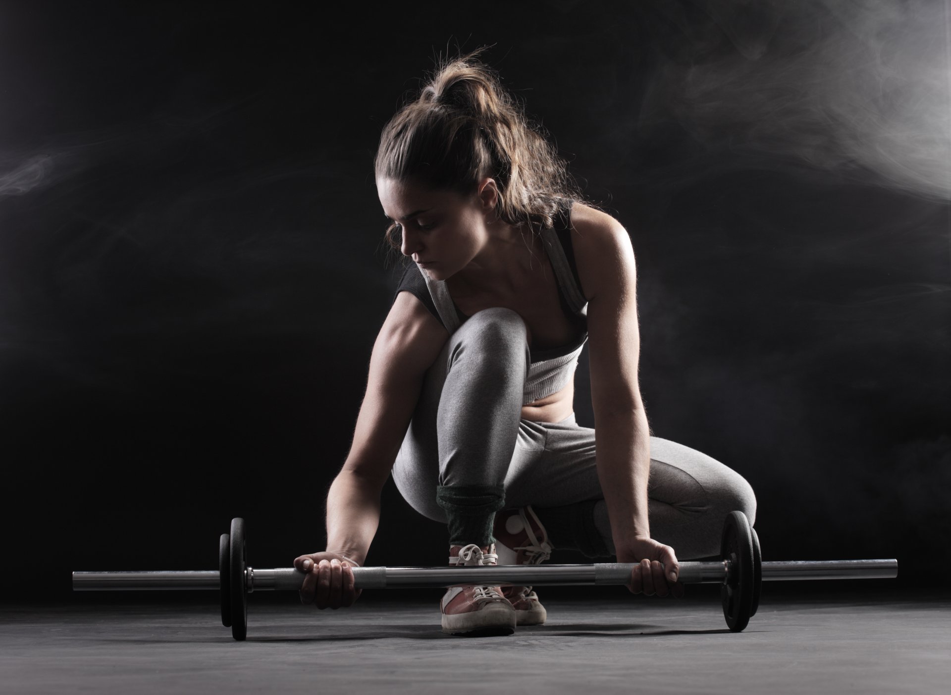 fitness mujer representar peso de la barra