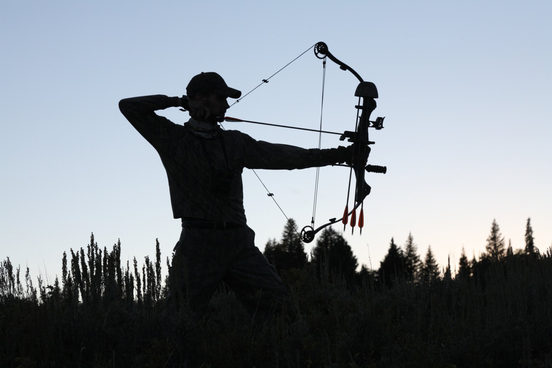 archery shadows man compound bow sunset