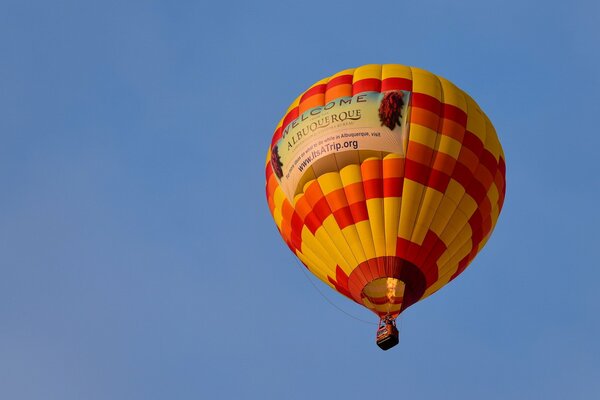 Balloon on a blue sky background