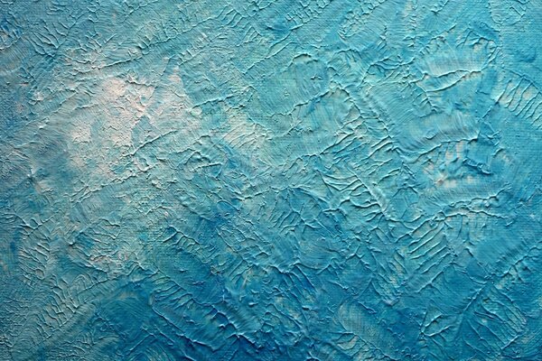 The background of blue-white plaster is textured