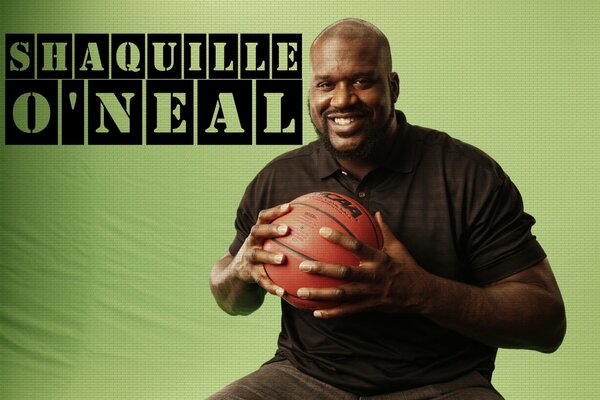 NBA player with a ball on a green background