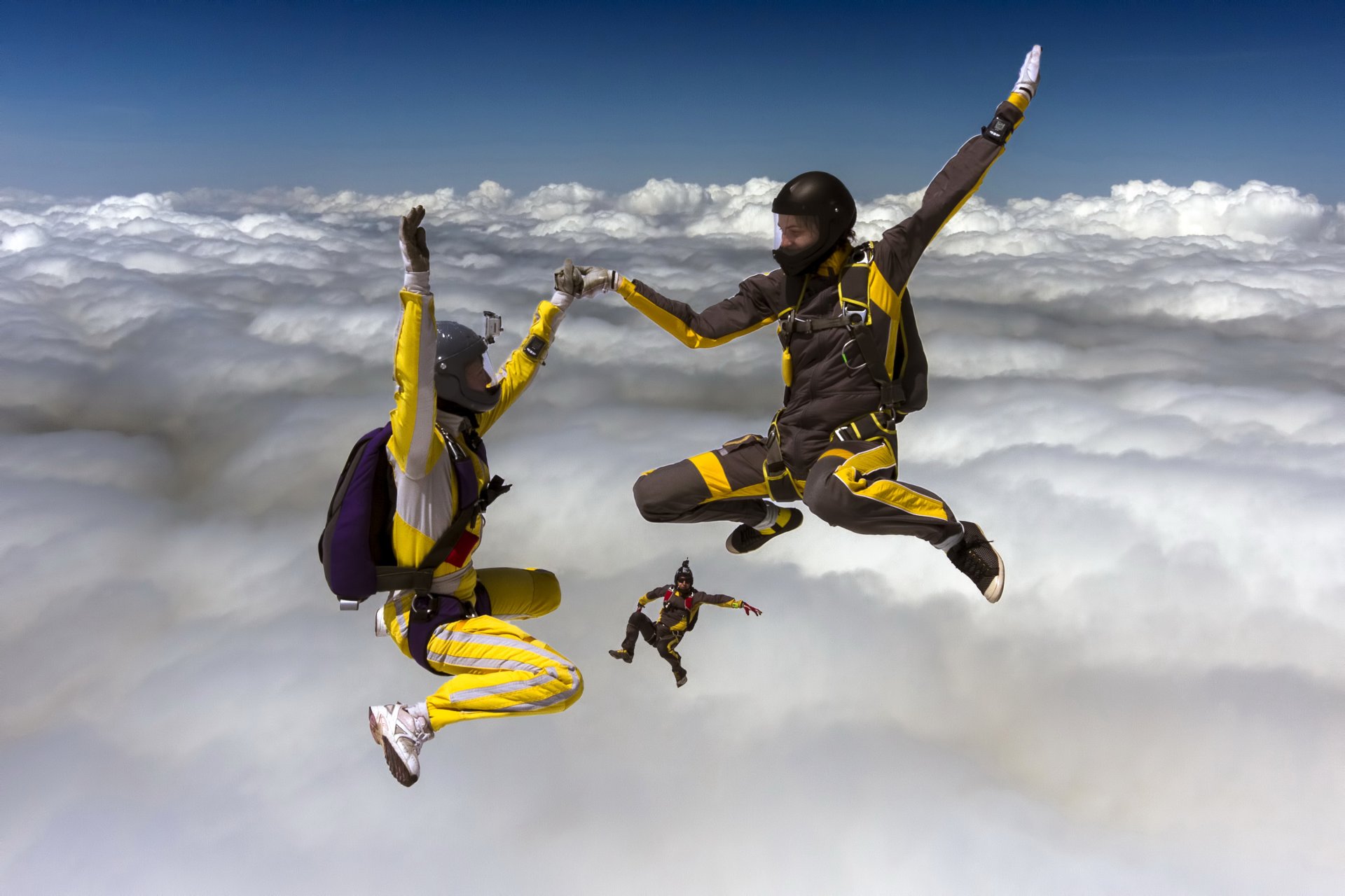 ky three parachutists form clouds sports photo