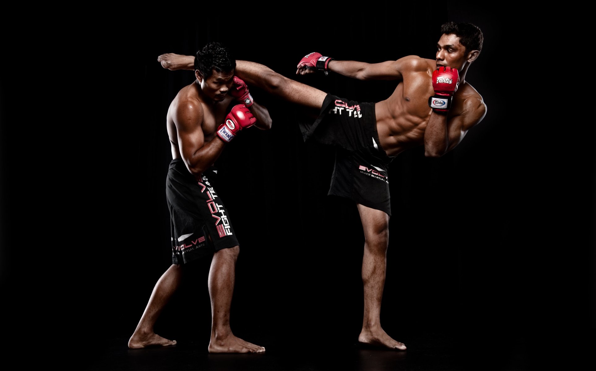 fighters mixed martial arts stance black background