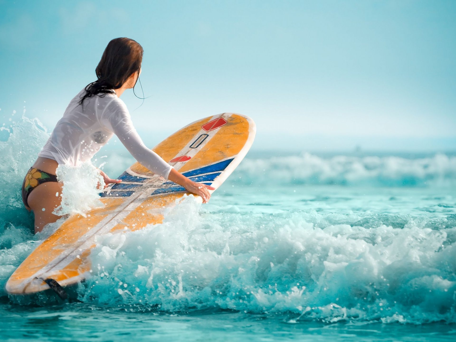 girl surfboard wave