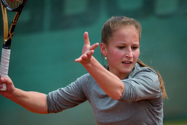 Kastner Steffi is a beautiful tennis player with a racket