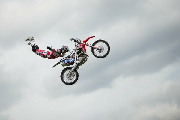 A motorcyclist in flight during a jump