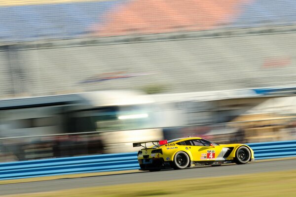 Yellow car at a car race