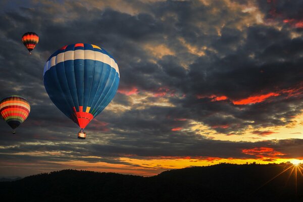 Balloons are flying in the sky