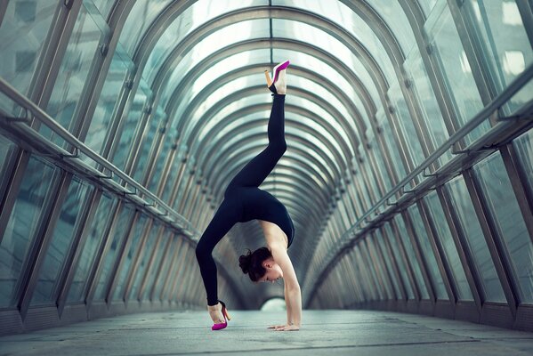 Girl in black tights tumbles