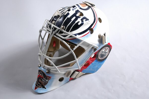 Hockey goalie mask on ice