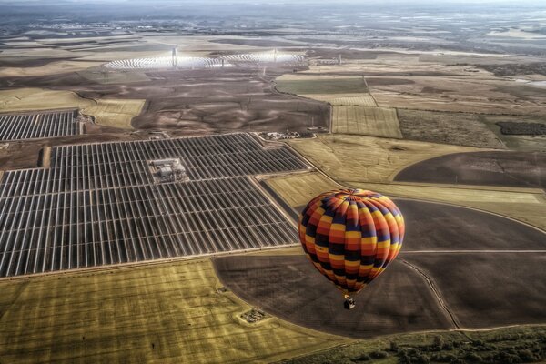 Balloon on the background of an unusual landscape