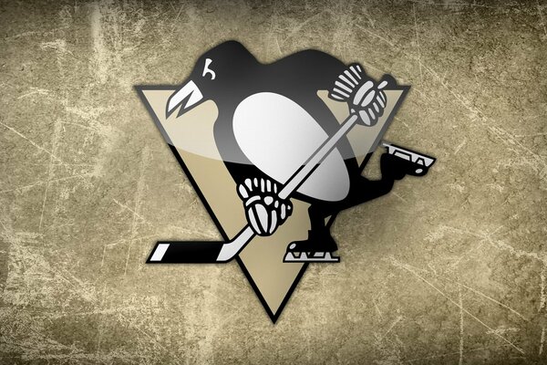 Le pingouin joue au hockey c est beau