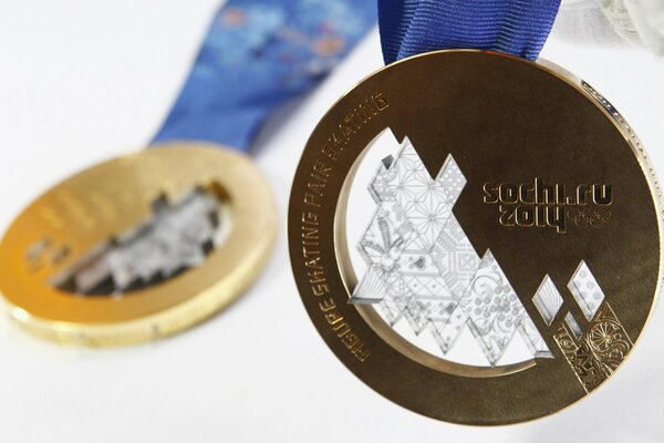 Макро изображение золотой медали олимпийских игр сочи-2014